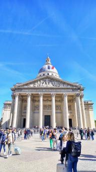 Neoclassical Building with Columns and Dome Under Blue Sky